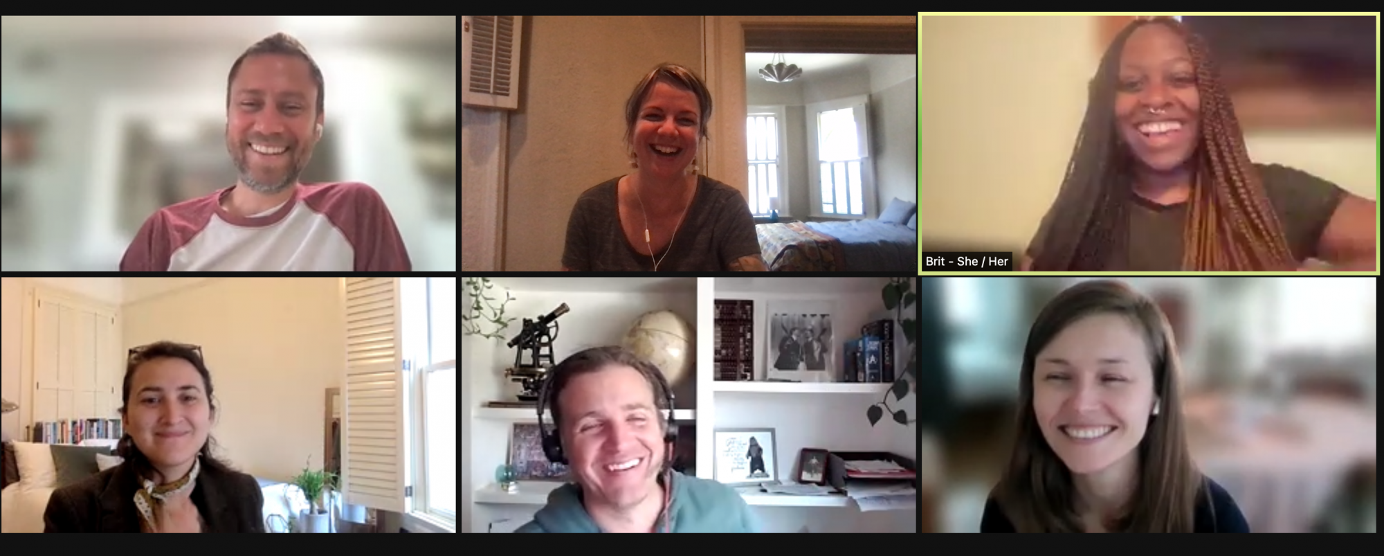 A screenshot of the team smiling on Zoom