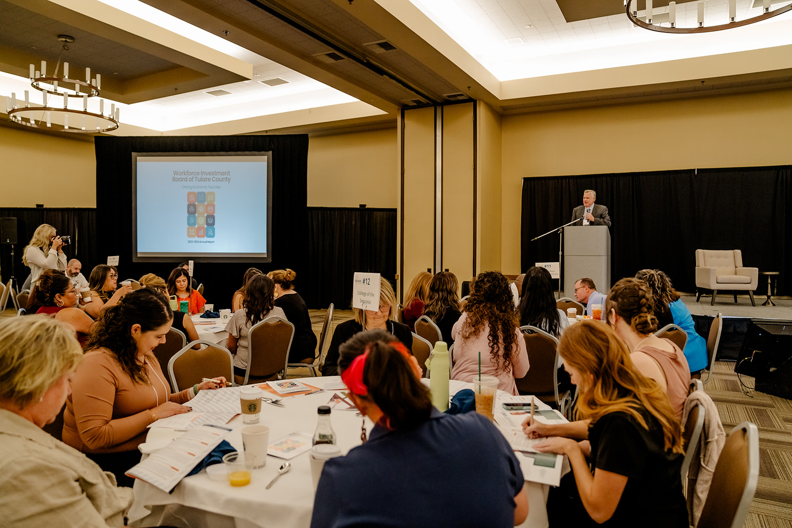 Adam Peck presenting the WIB's Annual Plan in front of the full conference.