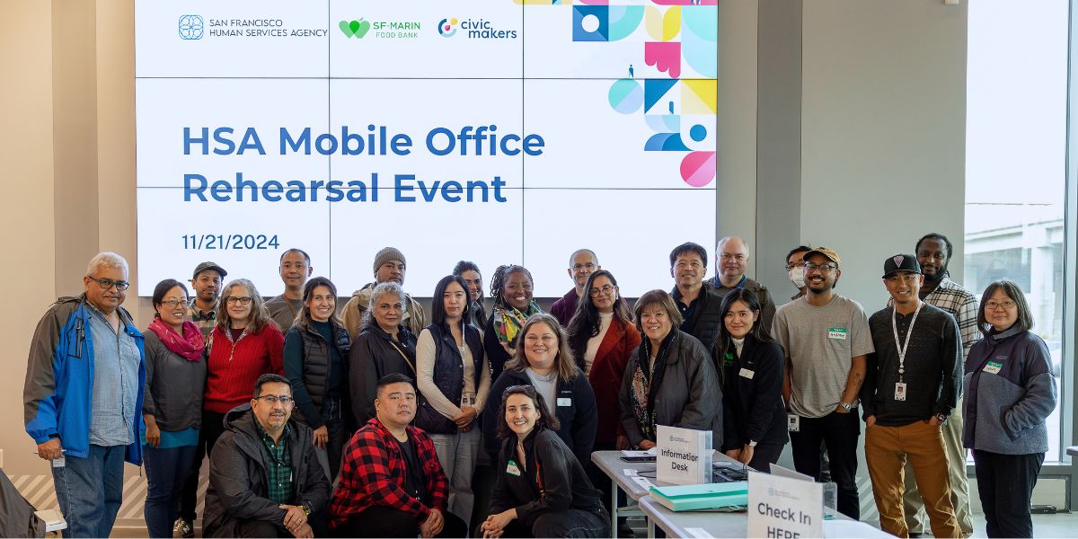 Large group photo of the HSA and SF-Marin Food Bank staff members that joined the rehearsal event. 